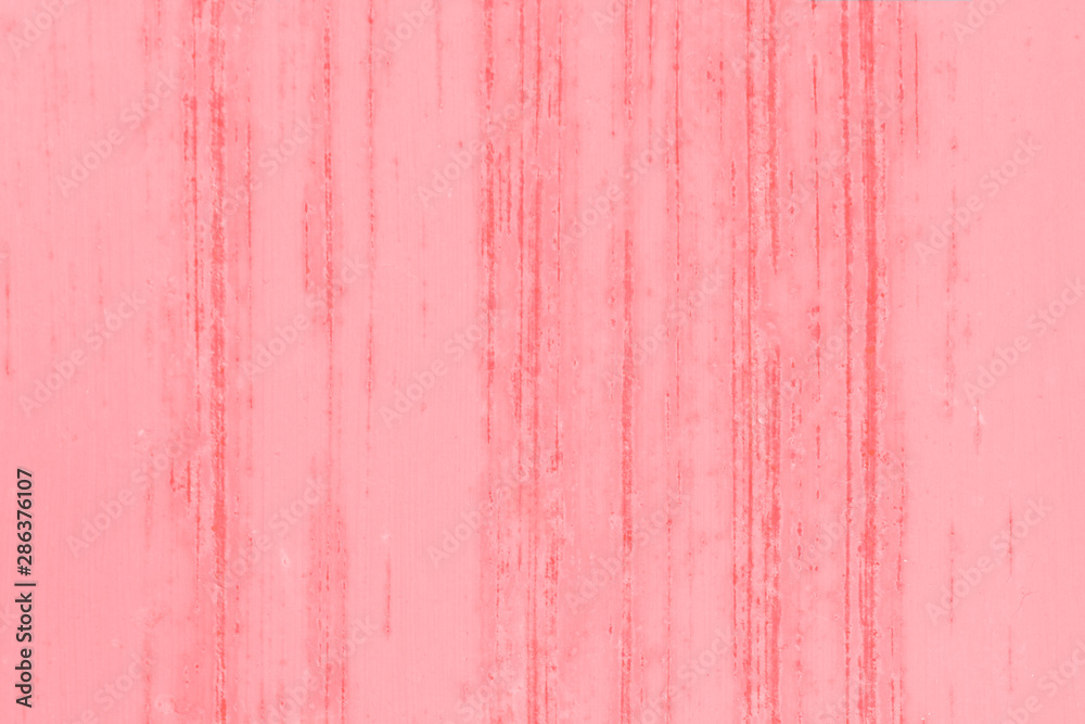 Vertical scratches on a flat metal surface. Traces of rust. The texture is pink in color. Vertical scratches on a flat metal surface. Traces of rust. The texture is pink in color.