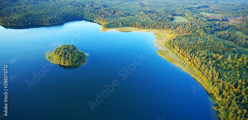 Aerial landscape from the drone - lake in masuria lake district
