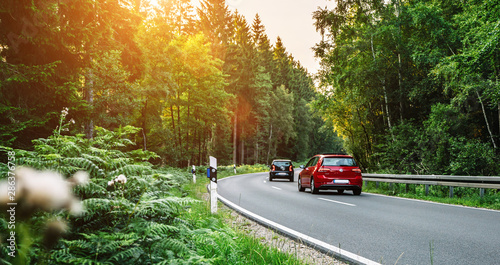 Valokuva Aachen, Germany - August 26, 2019: Golf and UP car in european mountain landscap