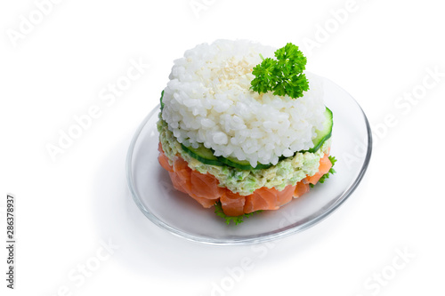 Salmon tartare with avocado and rice isolated on white