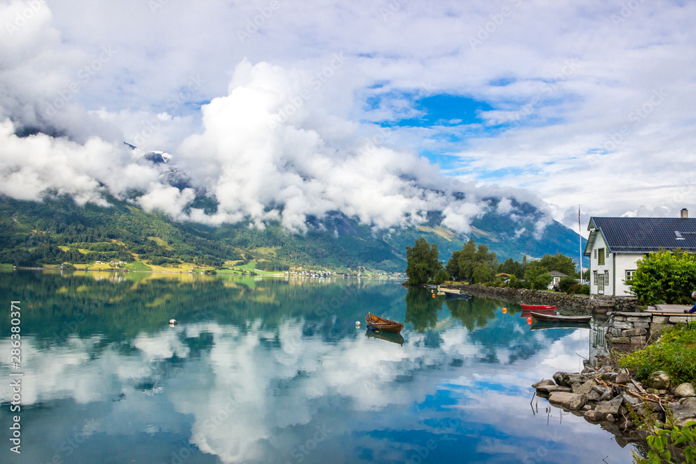 Fototapeta premium clouds over the fjord in Norway