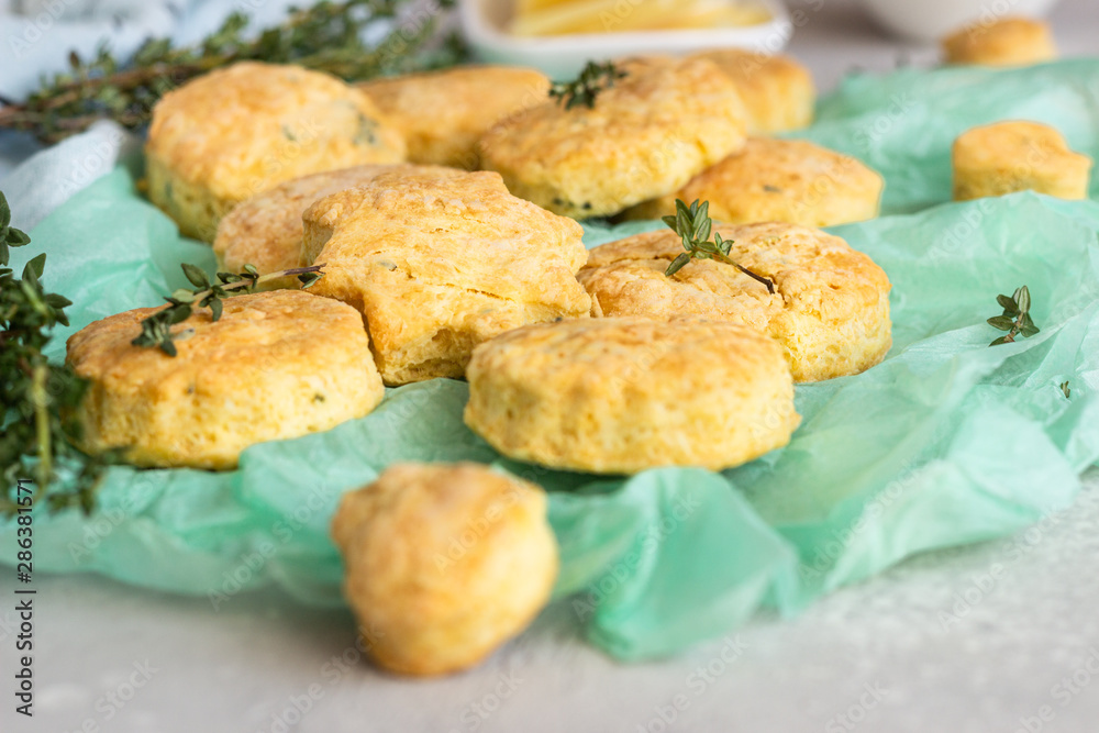 Freshly baked delicious english scones or cookies with cheese and thyme. Savory cheese scones or cookies. Freshly baked delicious english scones or cookies with cheese and thyme. Savory cheese scones or cookies.