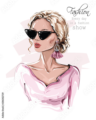 Hand drawn beautiful young woman in sunglasses. Stylish girl with earring. Fashion woman look. Sketch. Vector illustration.