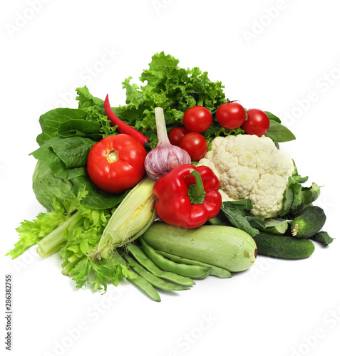 Vegetable pile on white