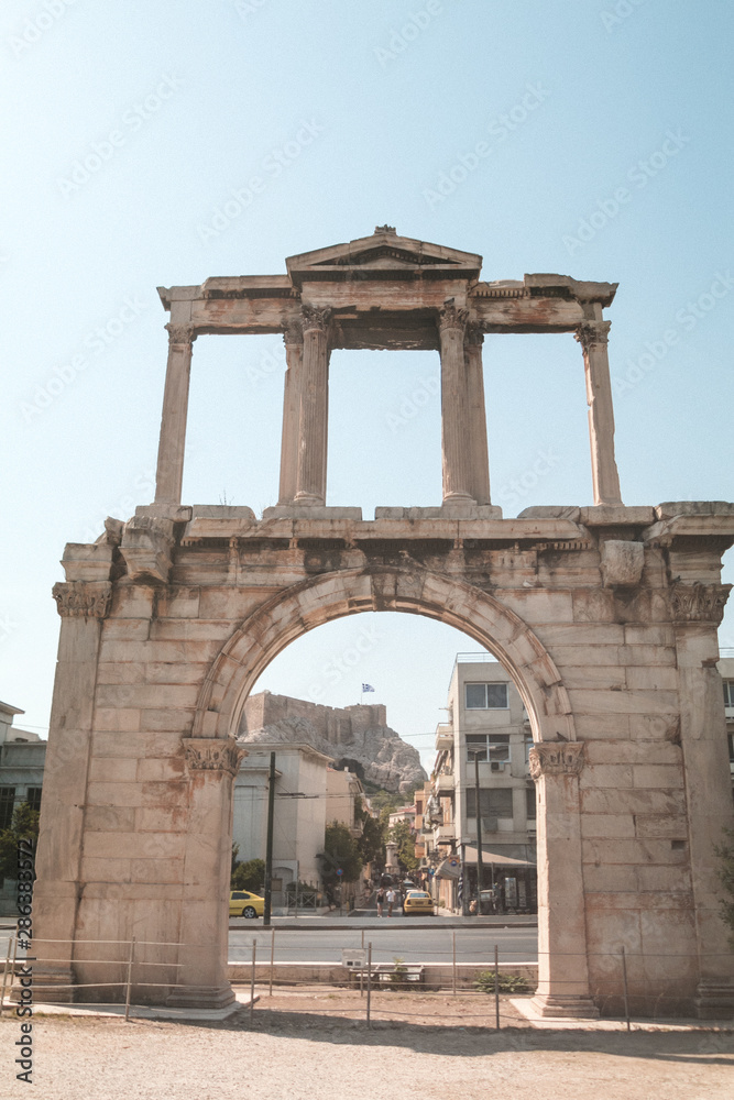 Arch of Hadrian or Hadrian's Gate monument with the Parthenon in the background, Athens, Greek