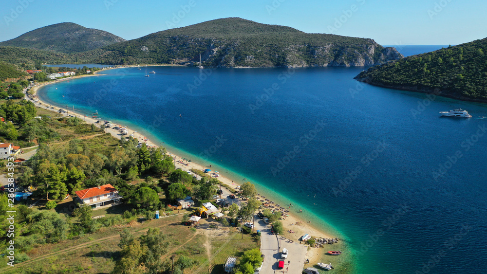 Obraz premium Aerial drone photo of iconic paradise bay and sandy beach of Porto Koufo with turquoise calm sea protected by winds, South Sithonia Peninsula, North Greece
