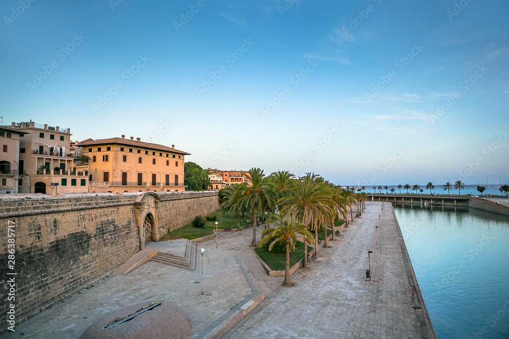 Sunset view of the Palma de Mallorca port and its old town