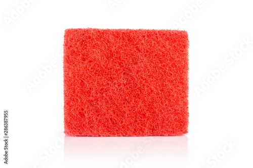 One whole red cleaning kitchen sponge isolated on white background
