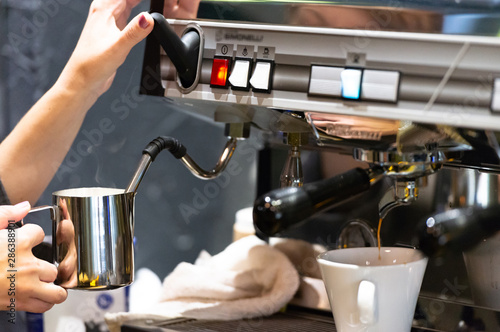 Coffee machine. Preparation of coffee with whipped milk.