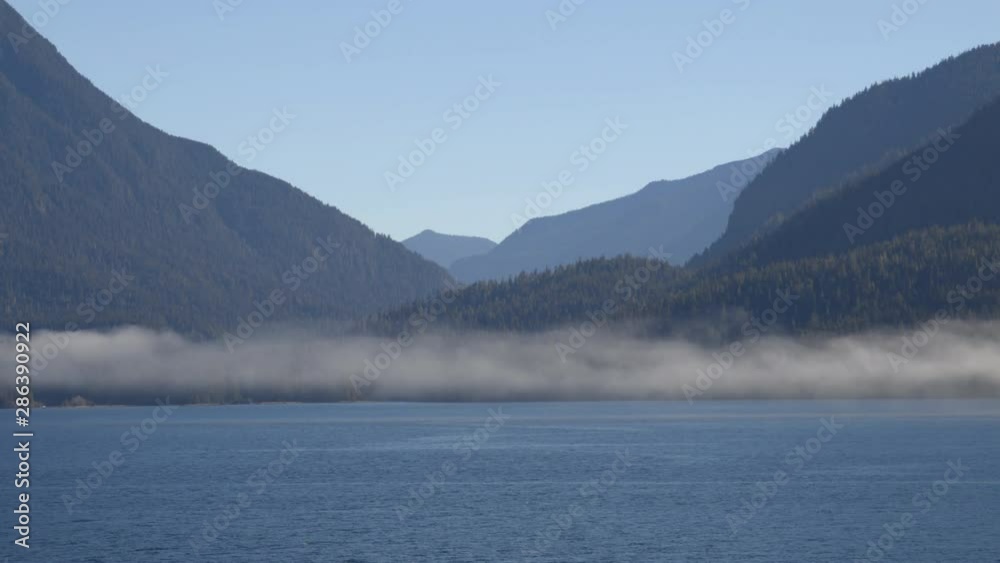 Alaska Nature Landscape - Inside passage seen from cruise ship. Seen from tourist on adventure travel tour in Alaska , Wilderness area in the Tongass National Forest. Alaska Nature Landscape - Inside passage seen from cruise ship. Seen from tourist on adventure travel tour in Alaska , Wilderness area in the Tongass National Forest.