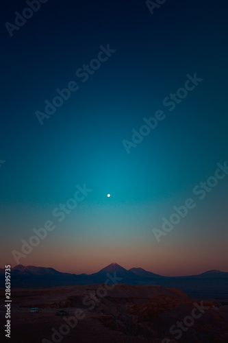 Mountains, volcano and moon in the desert © Elo Kyrmse