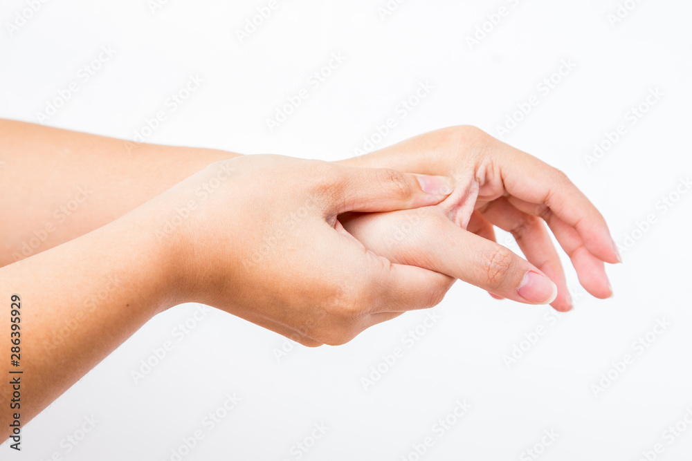 Woman suffering from hand pain on white background