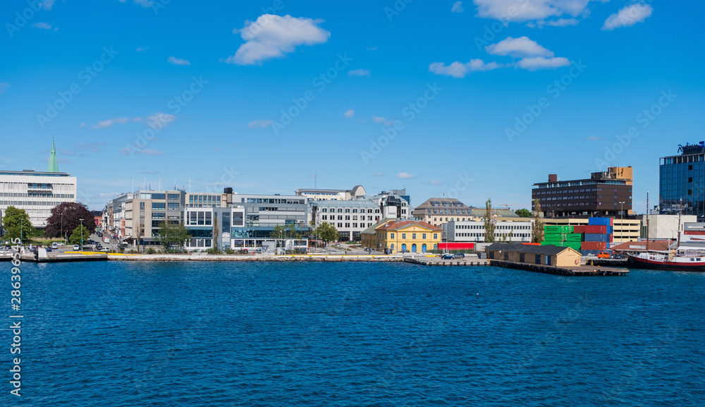 Beautiful seascape norwegian coastline, coast of Kristiansand with buildings, Scandinavia, Norway. July 2019 Beautiful seascape norwegian coastline, coast of Kristiansand with buildings, Scandinavia, Norway. July 2019