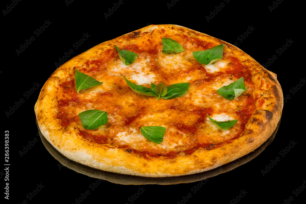 Italian pizza Margherita on black glass with reflection