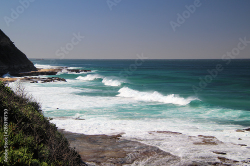 Heavy Swell and Surf Crashing on Rocks