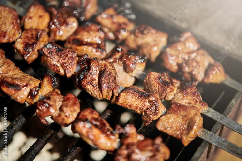 Barbecue skewers with meat on the brazier, lamb