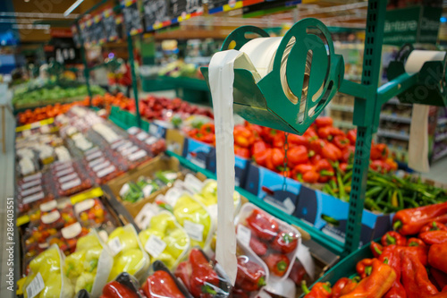 Biodegradable plastic food bags in the fruits and vegetables aisle in a big hypermarket in Romania