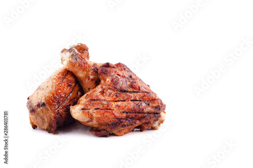 grilled chicken thighs and drumsticks on a white background,isolated 