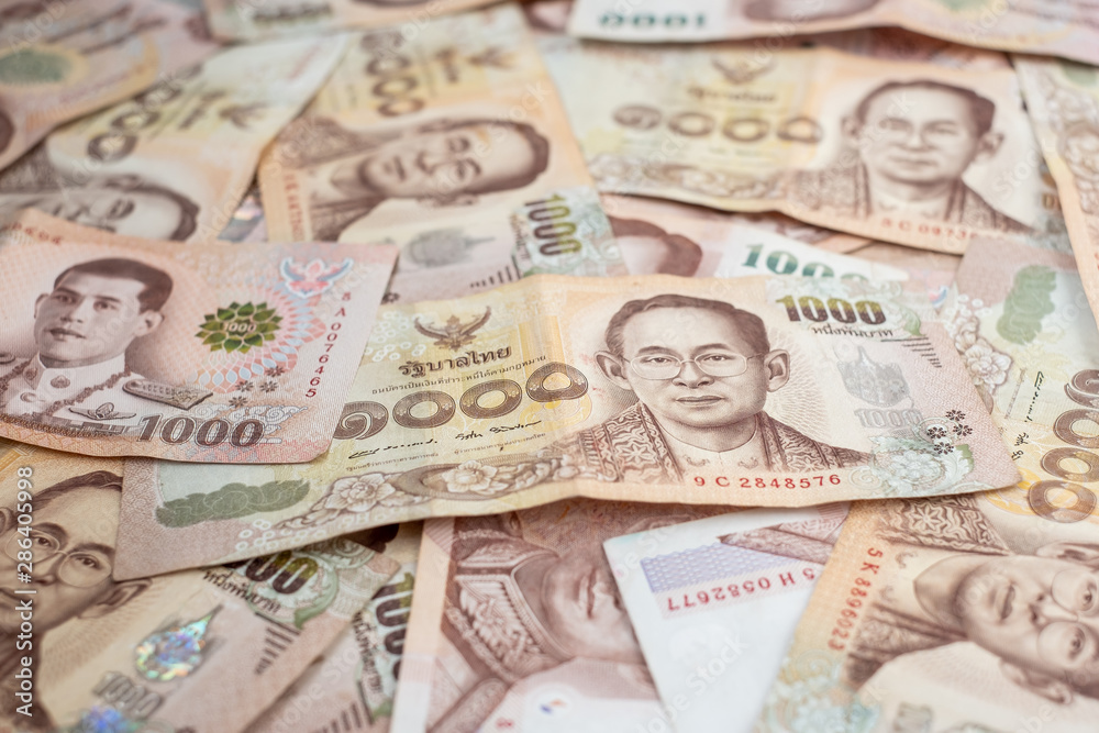1000 Thai baht banknote background. business, investment, retirement planning, finance and Saving for the future concepts 1000 Thai baht banknote background. business, investment, retirement planning, finance and Saving for the future concepts