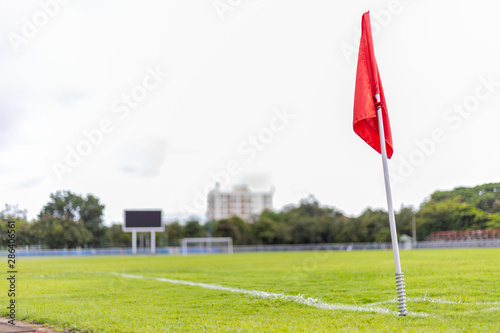 red corner flag of soccer field