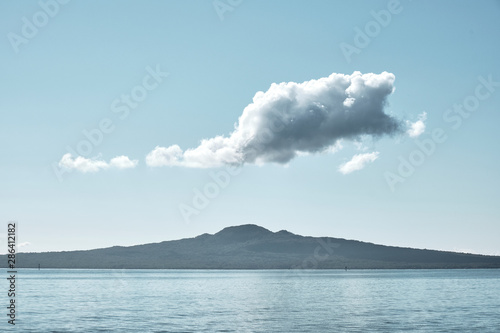 Rangitoto island Scanic Reserve from Auckland's Mission bay beach in mid-day time