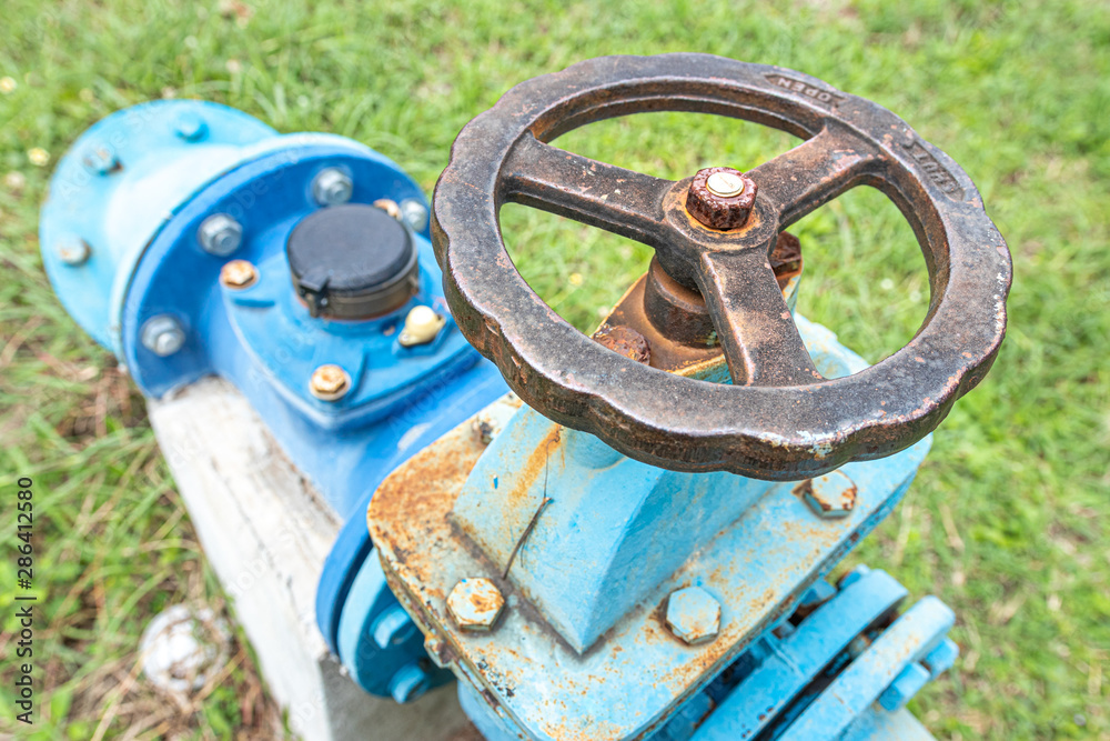 A pump station delivers water for agricultural watering, Water pumping station. Valve faucet and pumps A pump station delivers water for agricultural watering, Water pumping station. Valve faucet and pumps