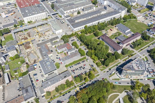 aerial view of industrial district with factories, plants and warehouses