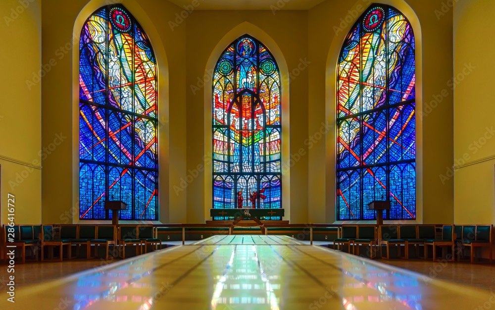 multicolored window stained-glass windows inside a beautiful historic church building