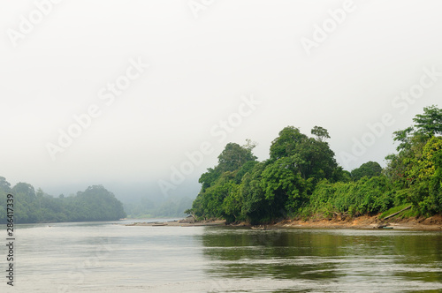 Indonesia - Tropical landscape on the river, Borneo photo