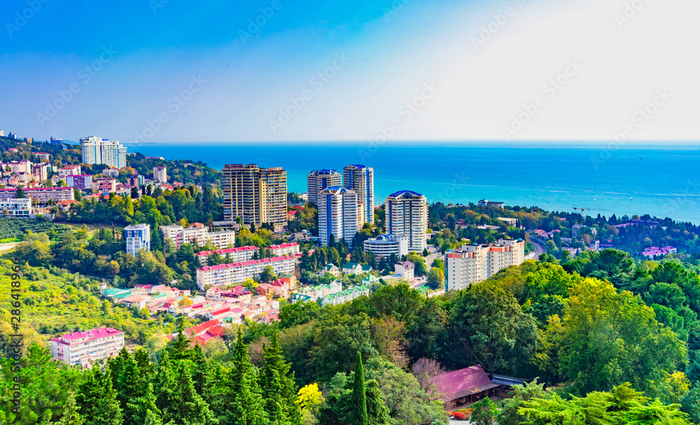 The urban landscape of a tropical resort city in the autumn time of year. The urban landscape of a tropical resort city in the autumn time of year.
