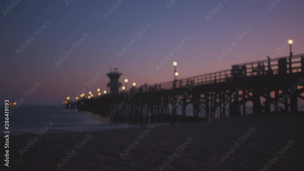 Dreamy focus on a nighttime pier. Dreamy focus on a nighttime pier.