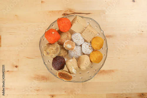 Traditional Bengali sweet sandesh rosokdom kalojam laddu Balushahi photo