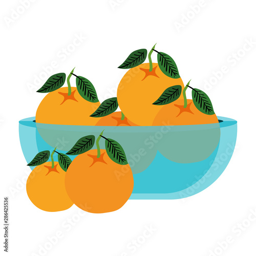 fresh oranges fruits in glass bowl