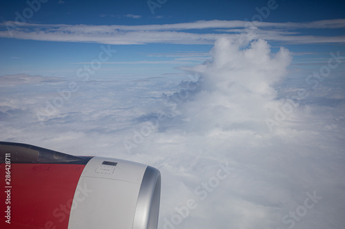 red turbine jet on sky