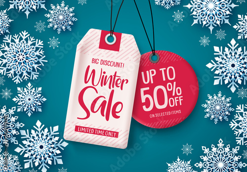 Winter sale tags vector banner. Sale tags hanging with falling snowflakes in blue background for business promotions. Vector illustration.