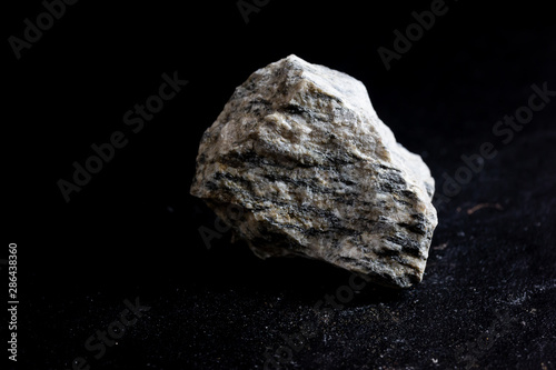 gneiss Rock isolate on black background photo