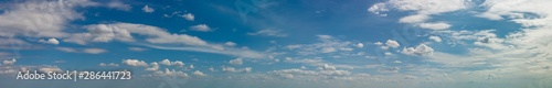 Fantastic soft clouds against blue sky, natural composition - panorama