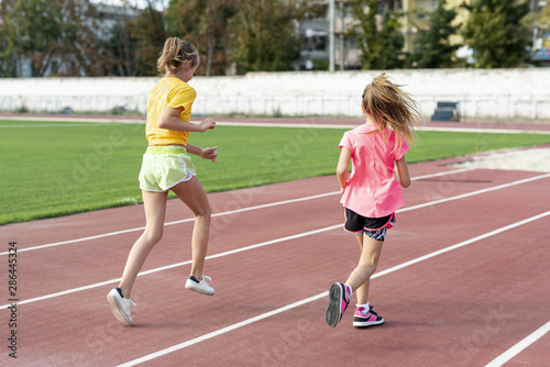 Back view of girls running