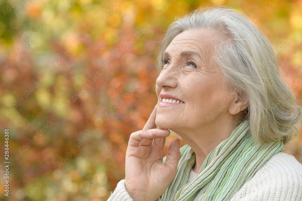 Close up portrait of senior woman on nature Close up portrait of senior woman on nature
