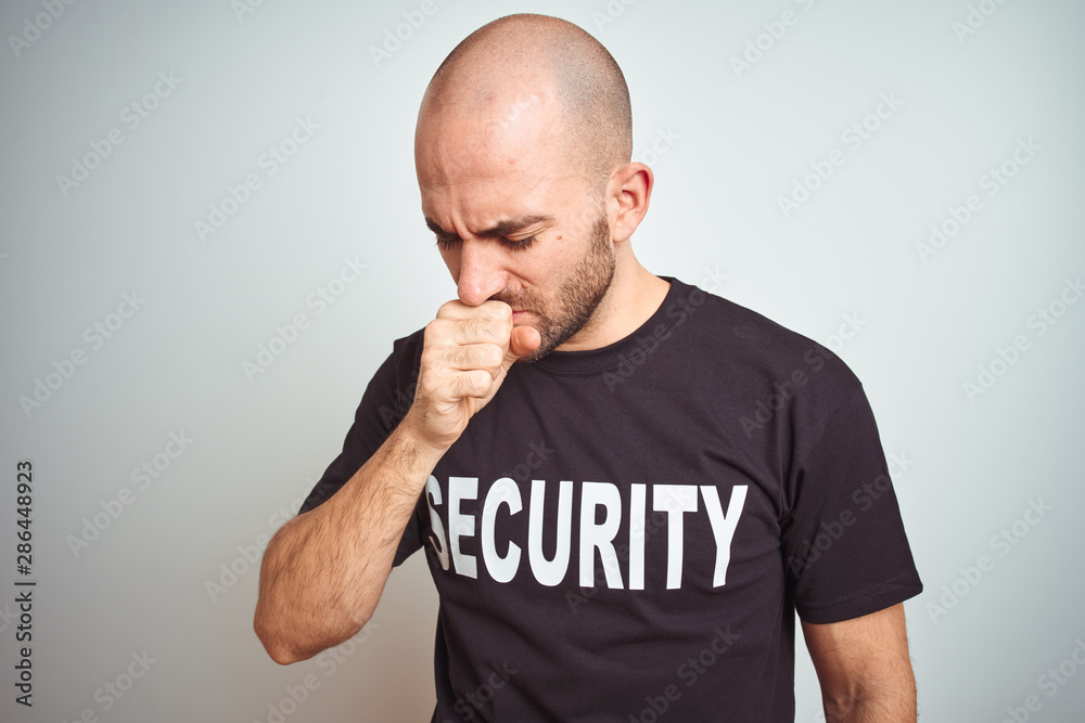 Young safeguard man wearing security uniform over isolated background feeling unwell and coughing as symptom for cold or bronchitis. Healthcare concept. Young safeguard man wearing security uniform over isolated background feeling unwell and coughing as symptom for cold or bronchitis. Healthcare concept.