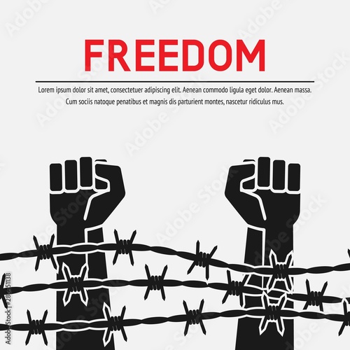 Fighting for freedom concept. Hands clenched into fist behind barbed wire