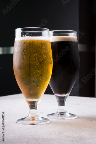 Dark and light beer glasses on a table