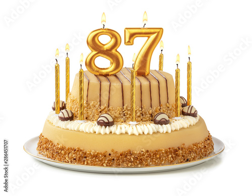 Festliche Torte mit goldenen Kerzen - Nummer 87