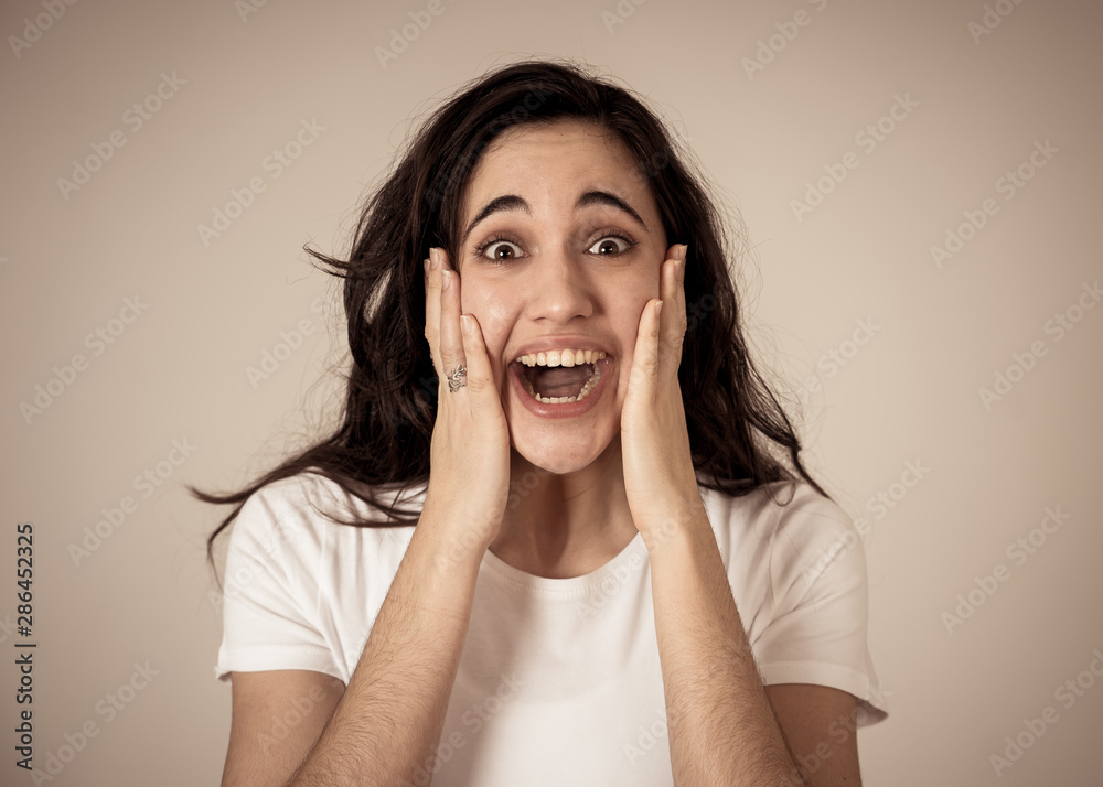 Young excited woman shocked and happy looking at unbelievable sales or surprise with overjoy Young excited woman shocked and happy looking at unbelievable sales or surprise with overjoy