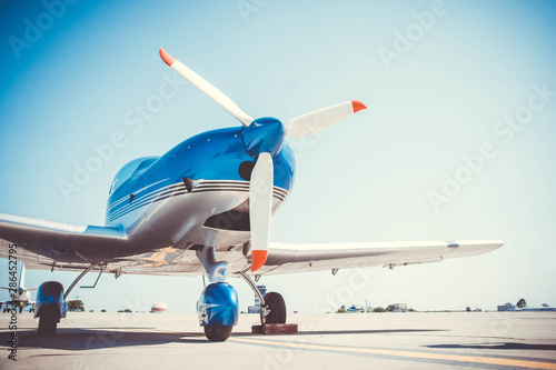 Fotografie Beautiful shiny sport plane standing on airport runway
