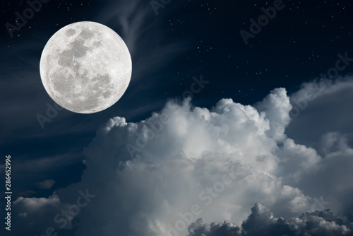 Full moon with white cloud on sky.