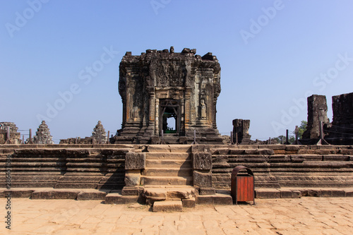 Ruins of old Phnom Bakheng Temple in Angkor in Cambodia. The temple was constructed in the late 9th and early 10th century during the reign of the King Yasovarman I.