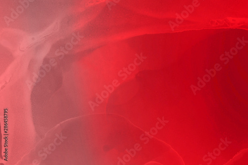 Hand painted alcohol ink background. Abstract red blood texture. Contemporary feminine wallpaper. 