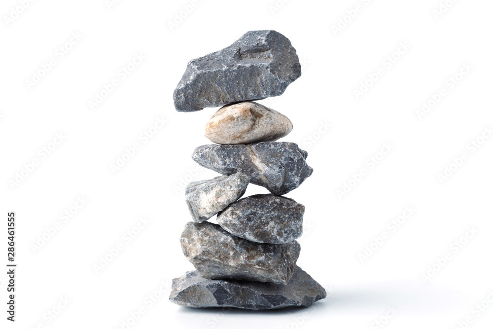 Pyramid of stones, isolated on white background. Zen Concept. Peaceful Concept. Pyramid of stones, isolated on white background. Zen Concept. Peaceful Concept.
