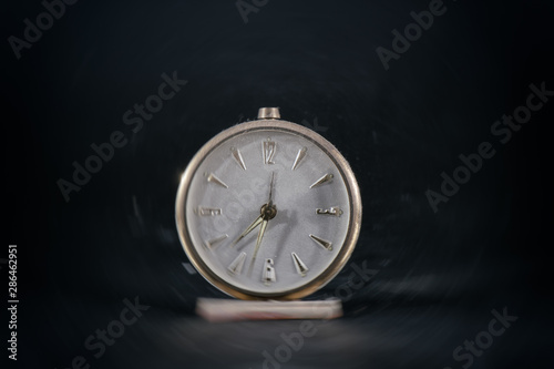 Antique vintage table clock. With blur effect